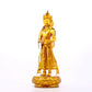 A solemn gilt bronze Bodhisattva stands