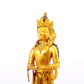 A solemn gilt bronze Bodhisattva stands