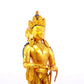 A solemn gilt bronze Bodhisattva stands