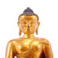 A solemn gilt bronze statue of Gautama Buddha