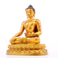 A solemn gilt bronze statue of Gautama Buddha