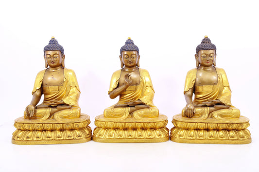 Three gilt bronze statues of Sakyamuni