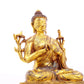 A serene gilt bronze statue of Gautama Buddha