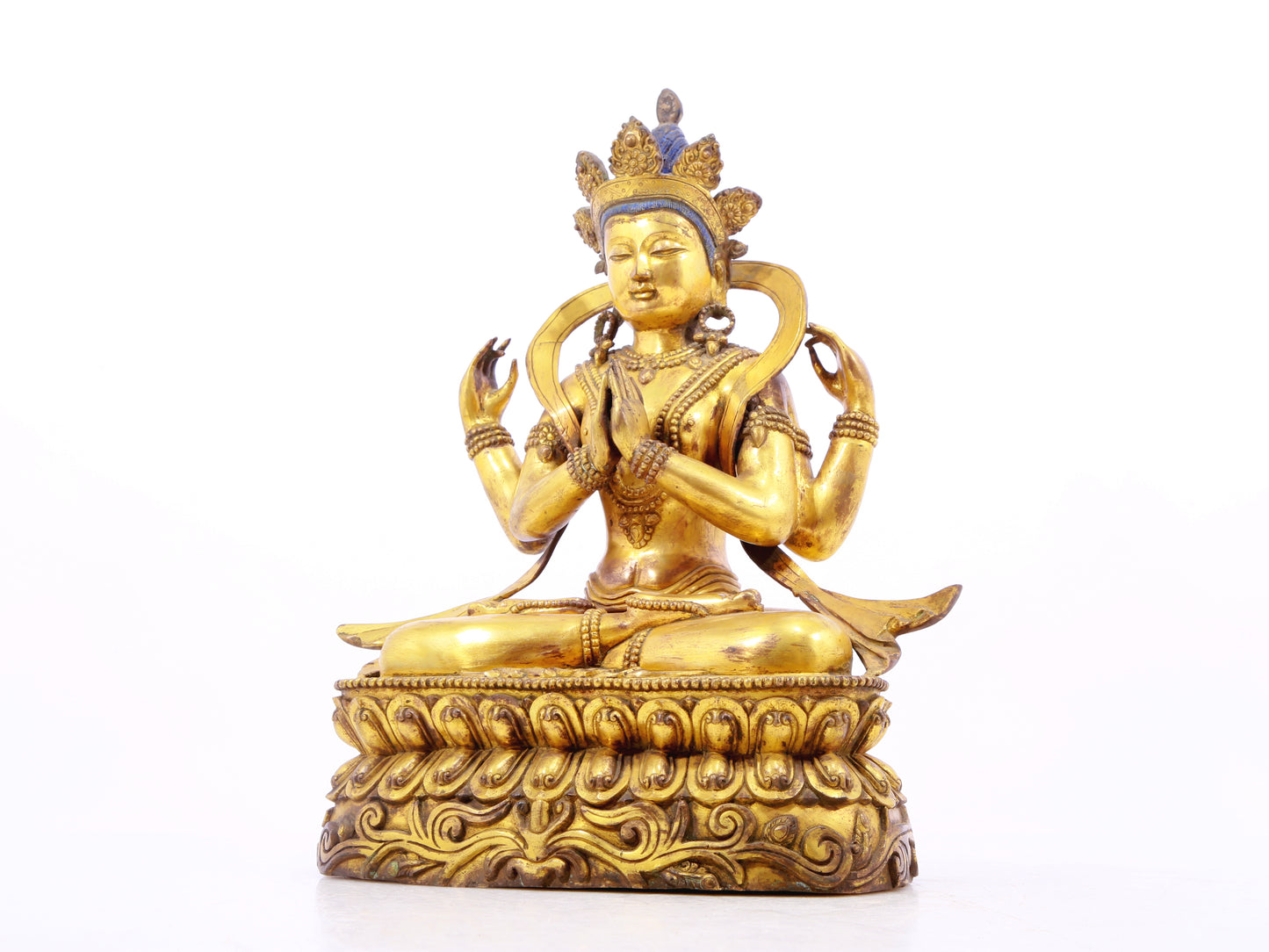 A solemn gilt bronze statue of Bodhisattva