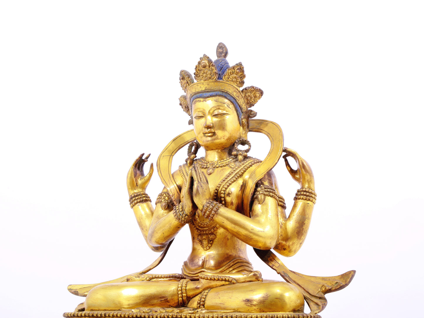 A solemn gilt bronze statue of Bodhisattva