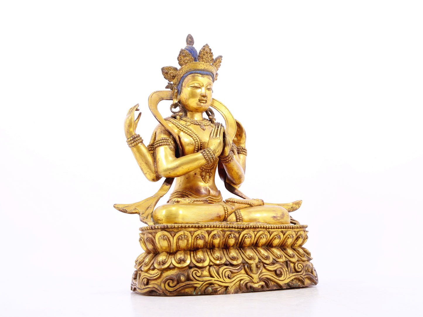 A solemn gilt bronze statue of Bodhisattva