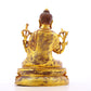 A serene gilt bronze statue of Gautama Buddha