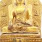 A solemn gilt bronze statue of Gautama Buddha