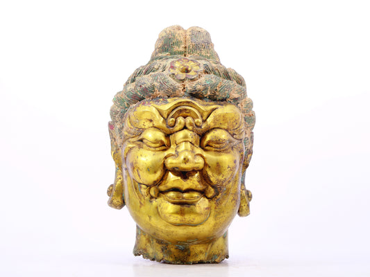 A solemn gilt bronze Vajra statue