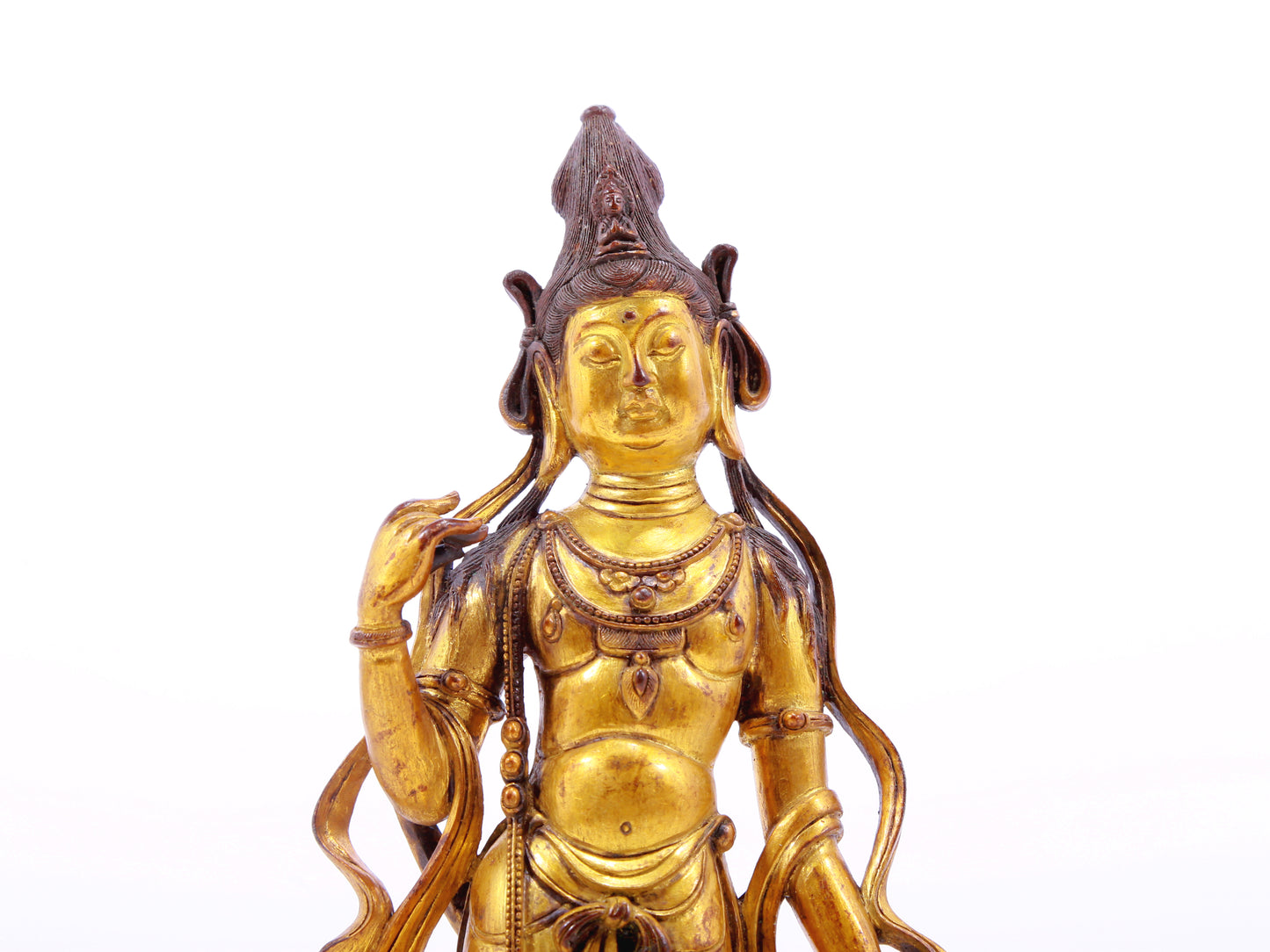 A serene gilt bronze statue of Bodhisattva