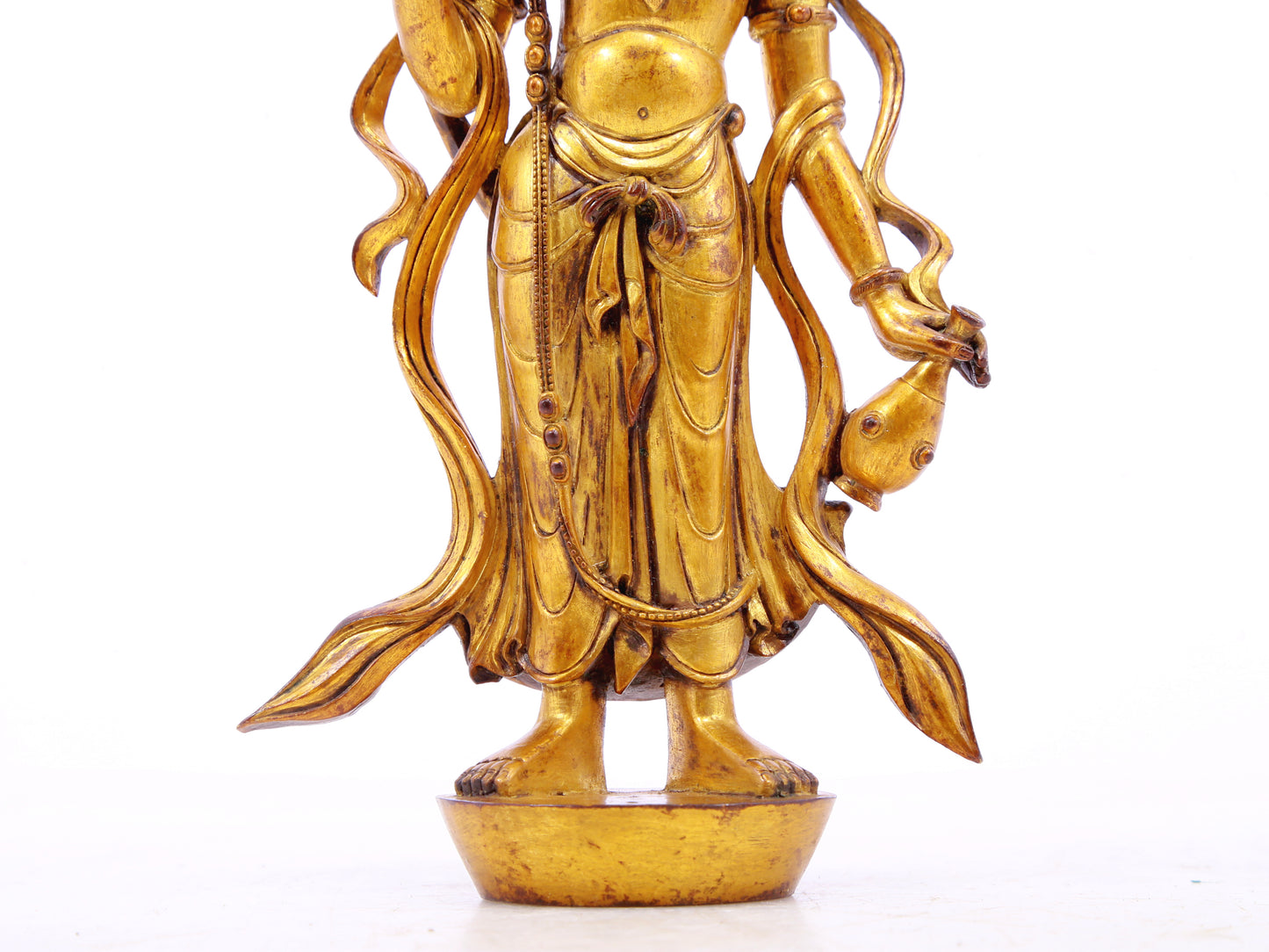 A serene gilt bronze statue of Bodhisattva