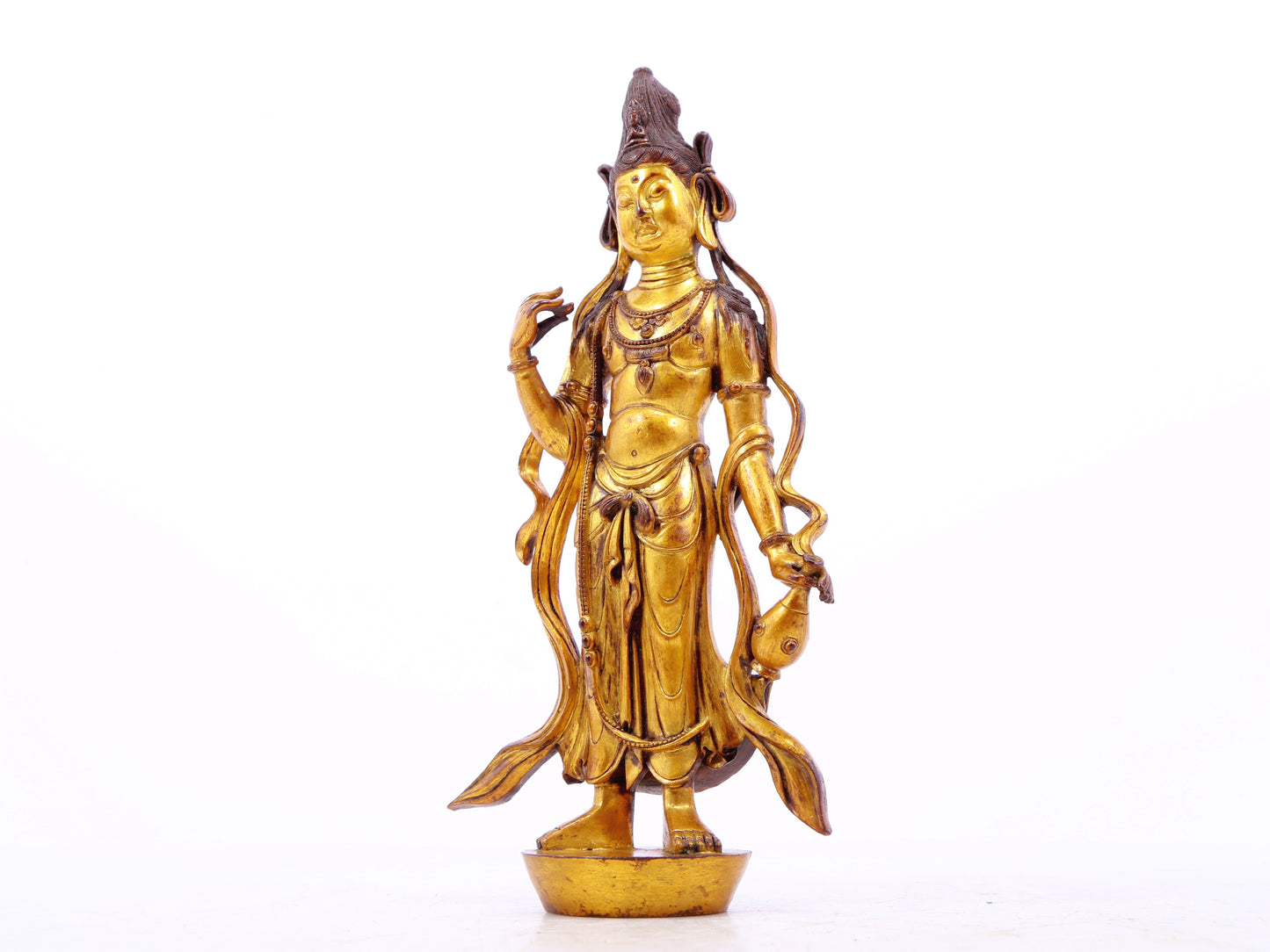 A serene gilt bronze statue of Bodhisattva