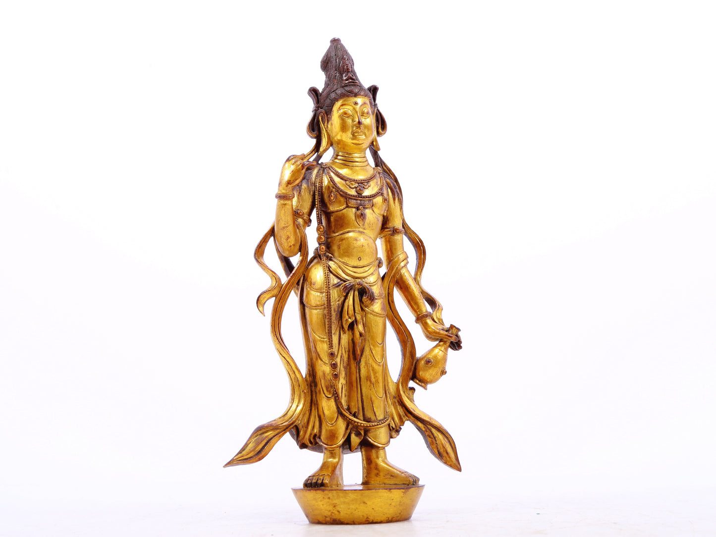 A serene gilt bronze statue of Bodhisattva