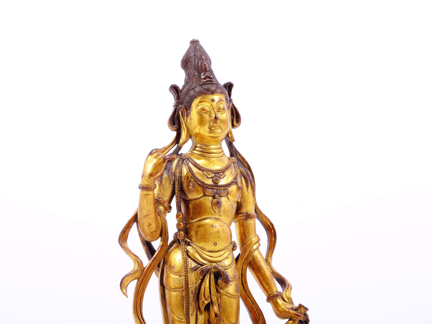 A serene gilt bronze statue of Bodhisattva