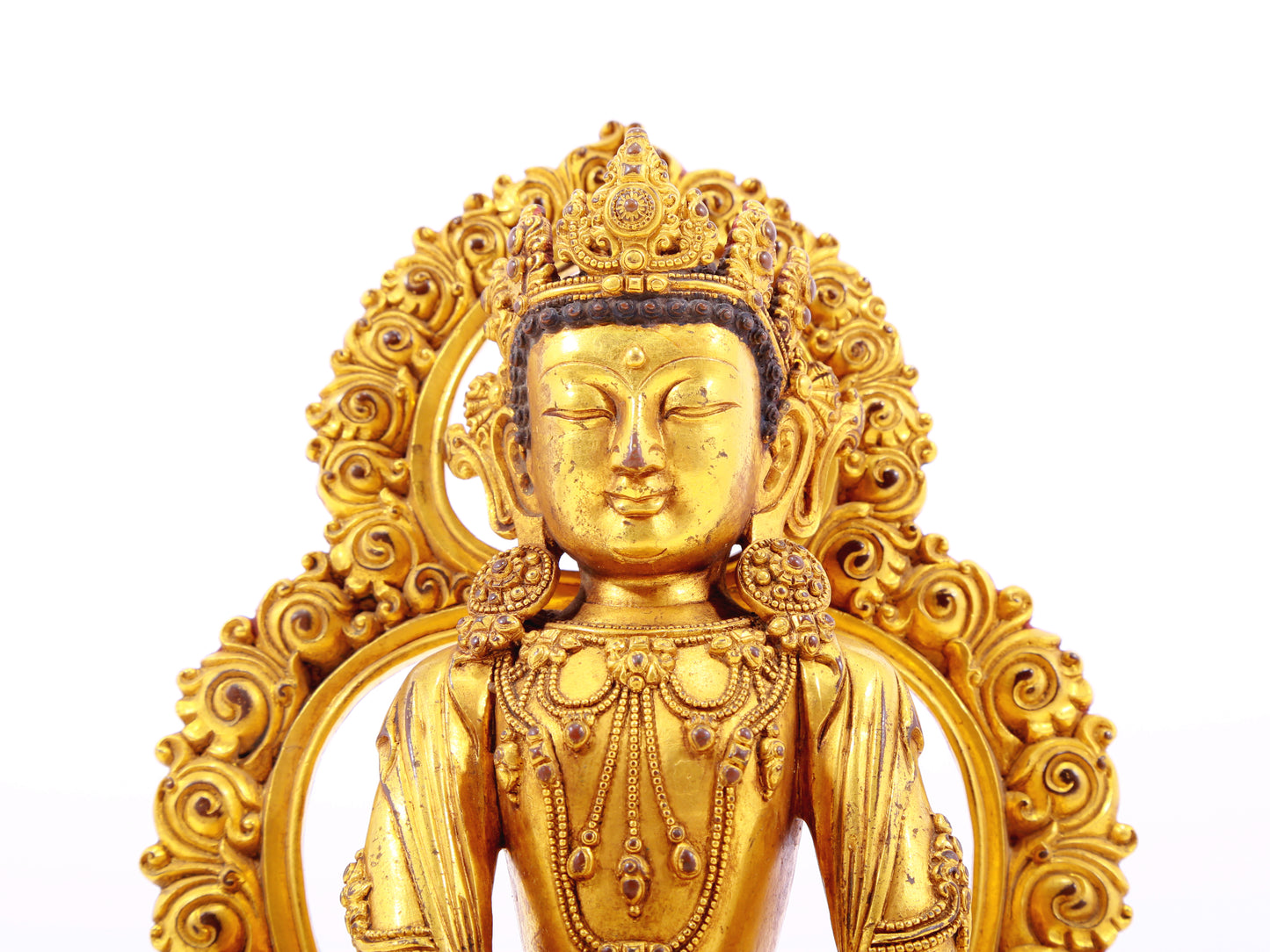 A solemn gilt bronze Bodhisattva statue