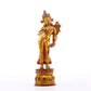 A serene gilt bronze statue of Tara