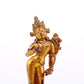 A serene gilt bronze statue of Tara