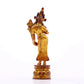 A serene gilt bronze statue of Tara