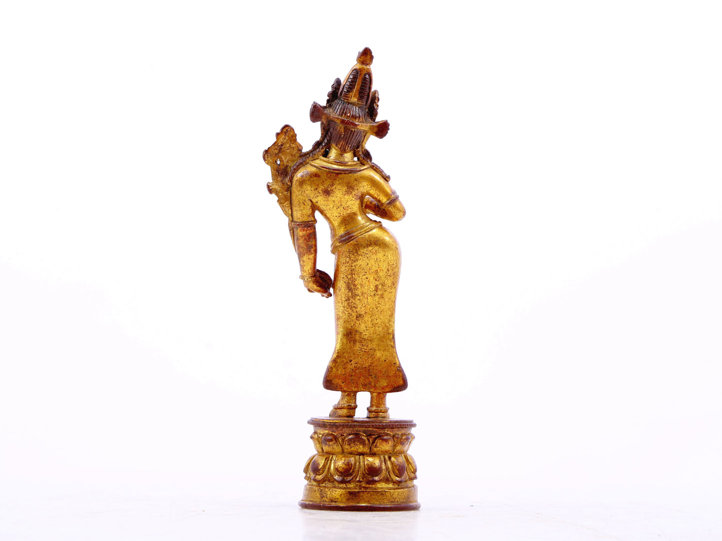 A serene gilt bronze statue of Tara