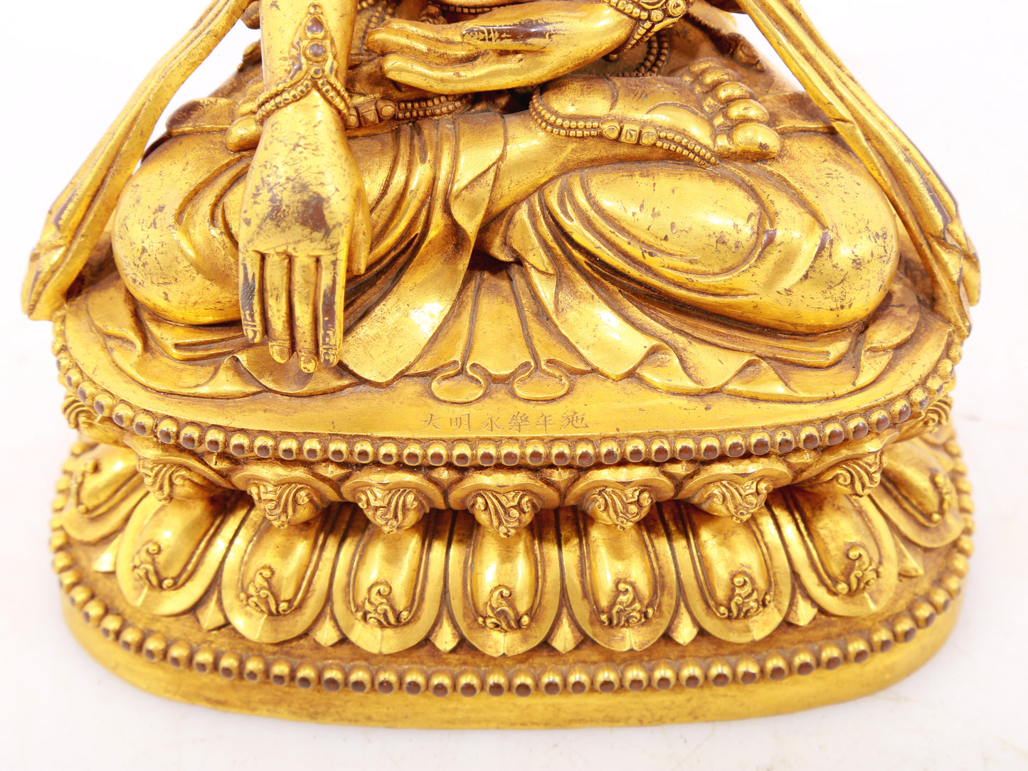 A solemn gilt bronze Bodhisattva statue