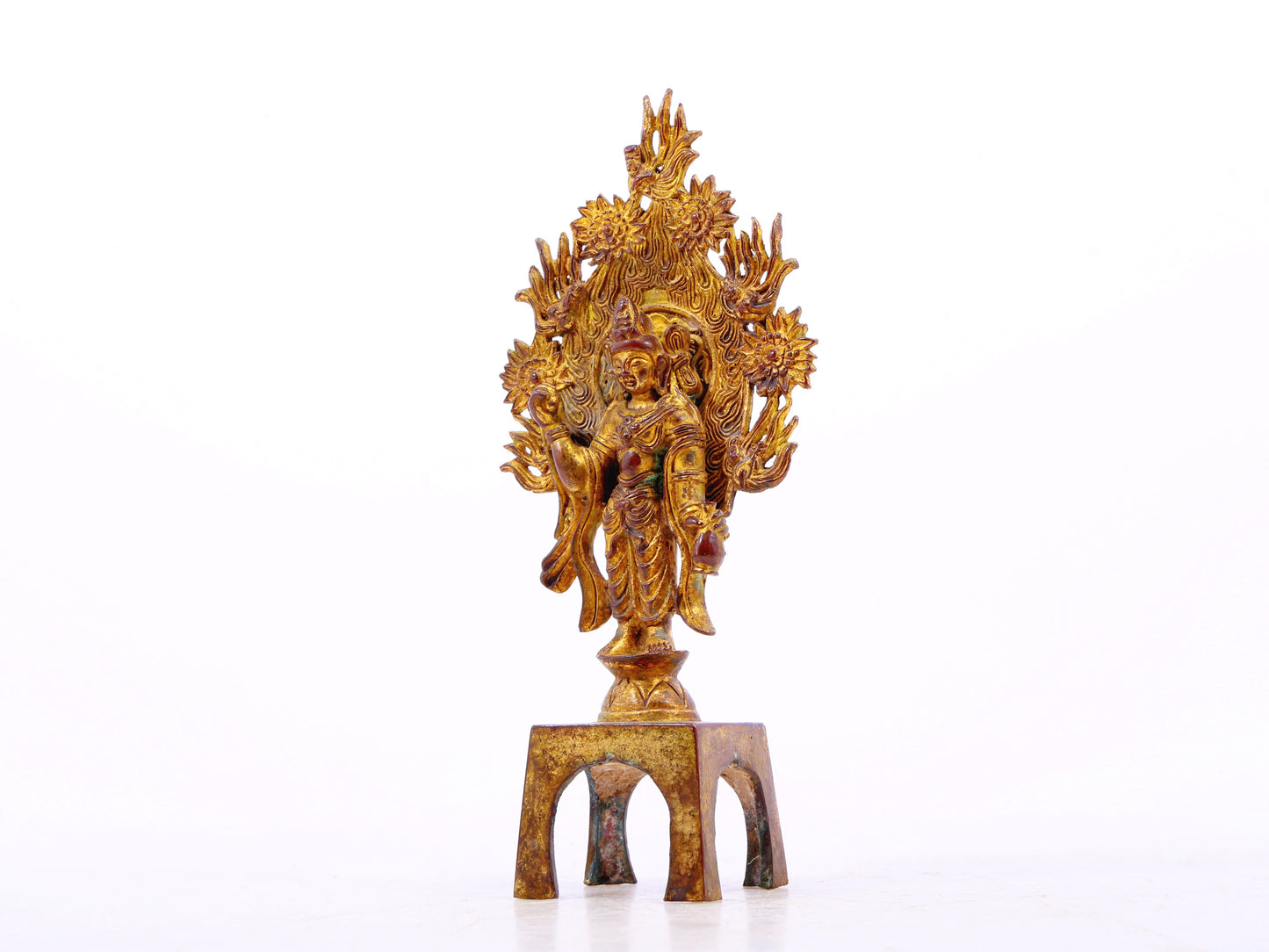 A serene gilt bronze statue of Bodhisattva