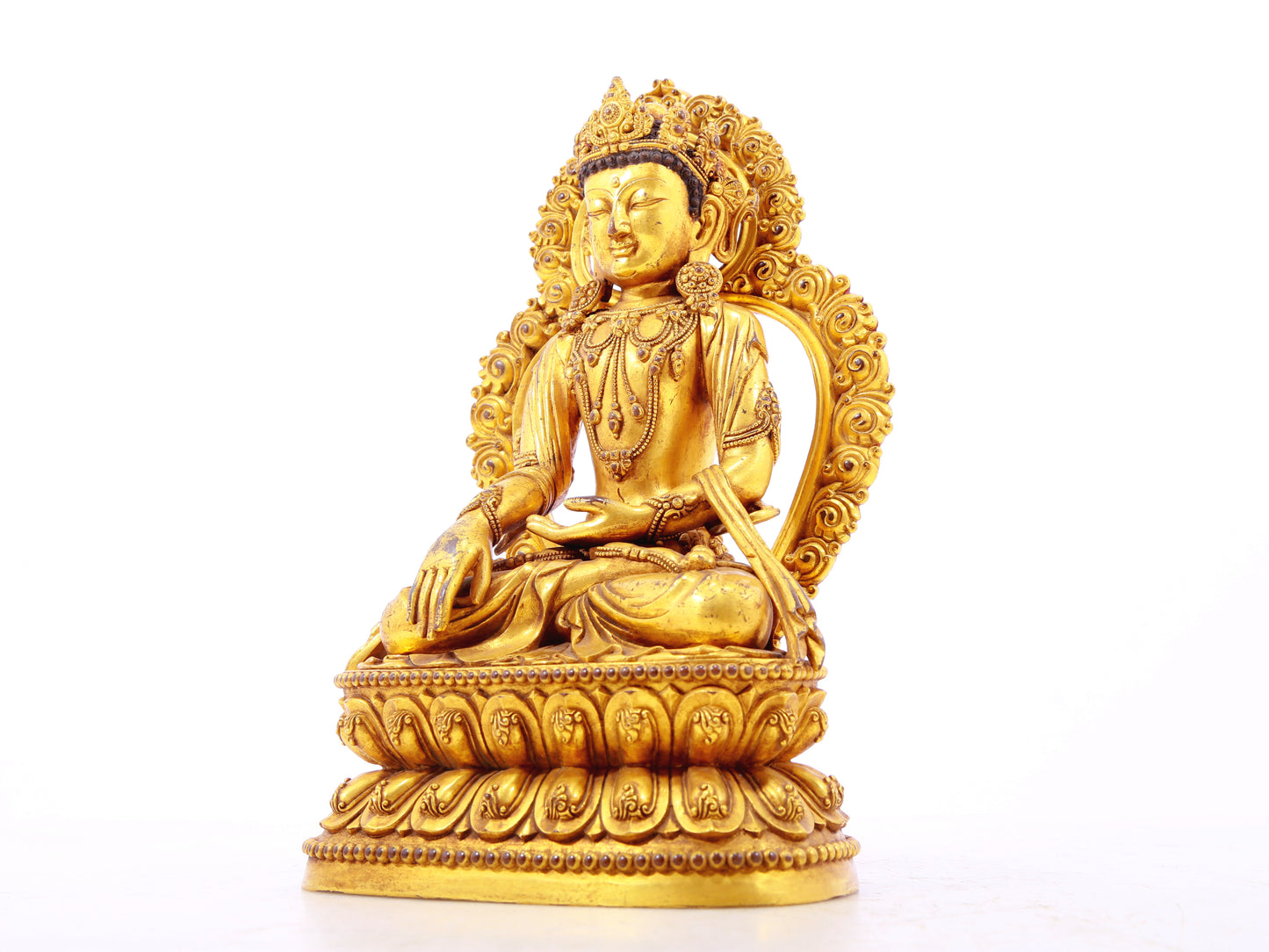 A solemn gilt bronze Bodhisattva statue