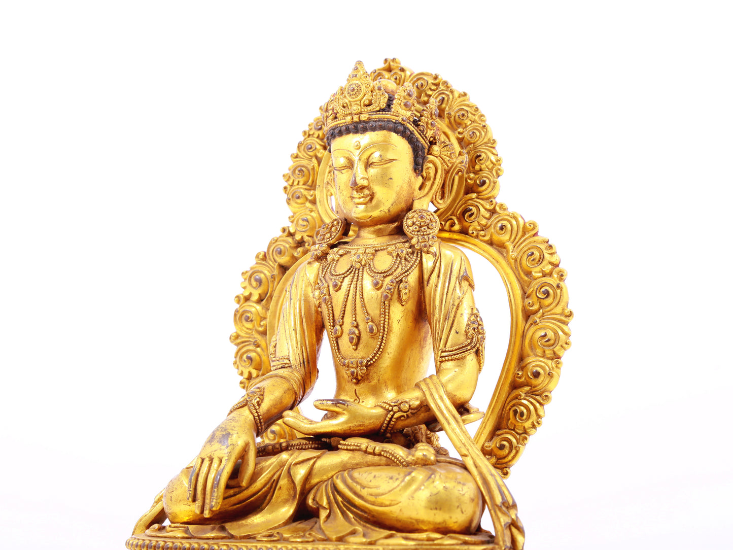 A solemn gilt bronze Bodhisattva statue