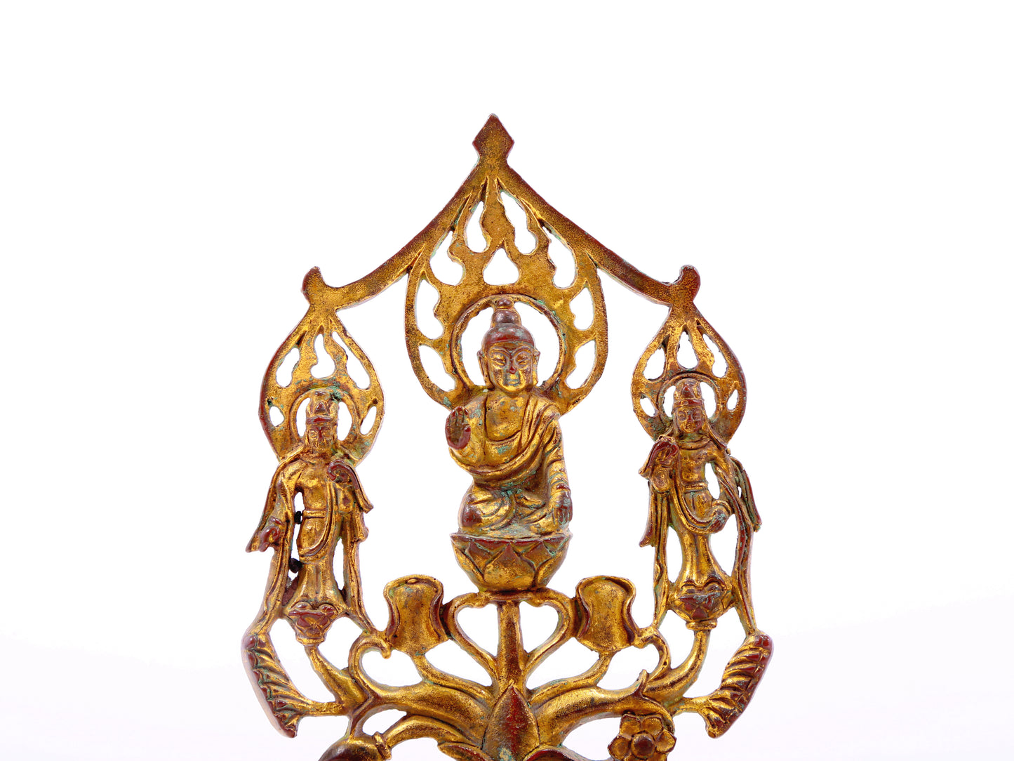 A serene gilt bronze statue of Gautama Buddha