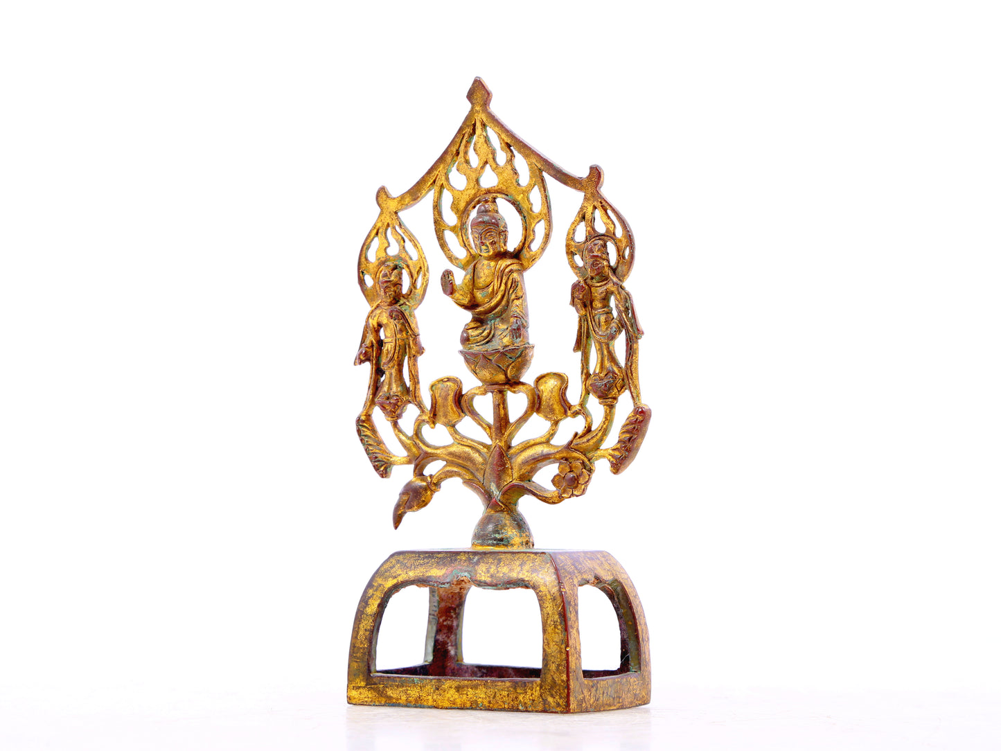 A serene gilt bronze statue of Gautama Buddha