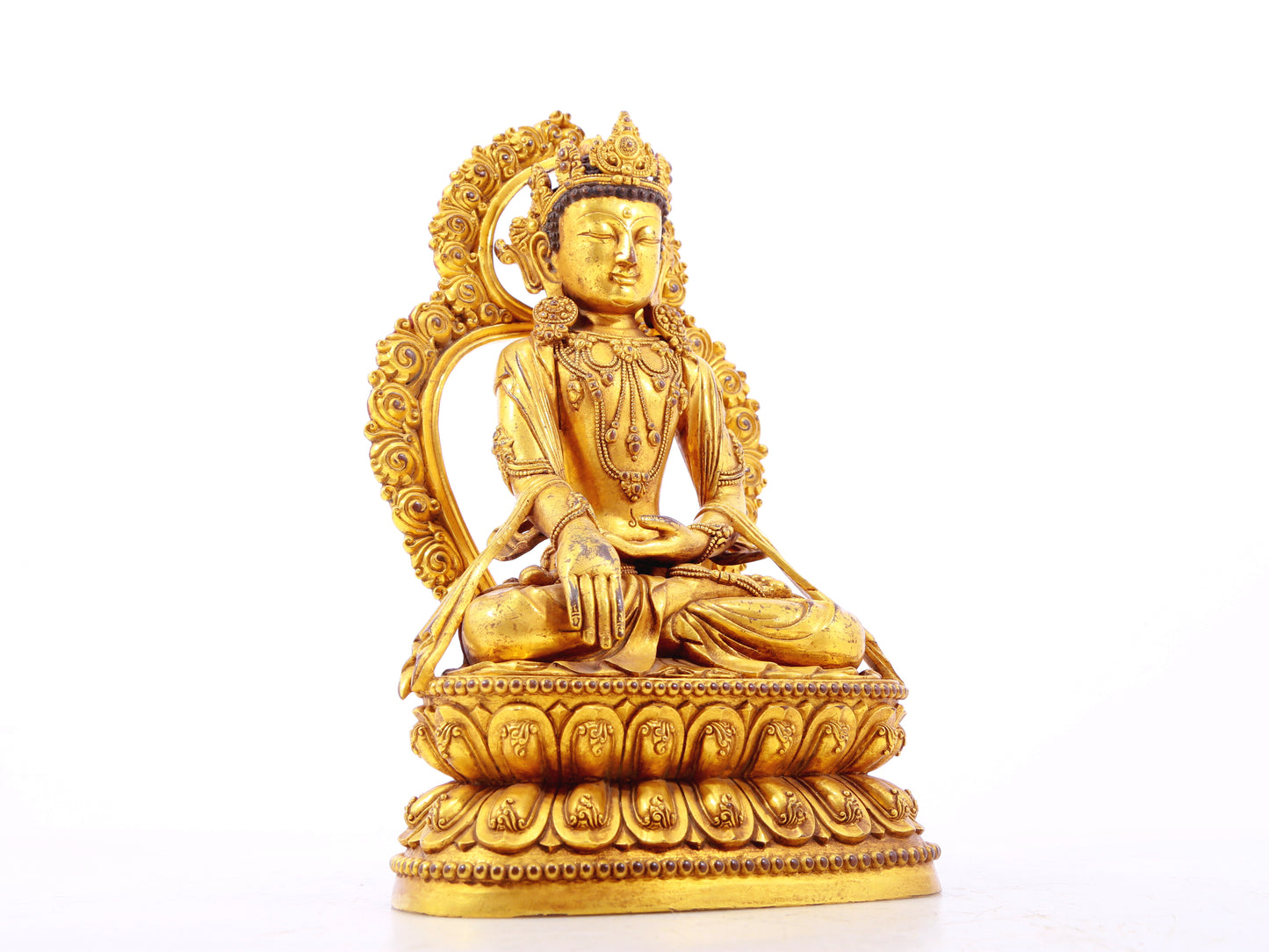 A solemn gilt bronze Bodhisattva statue