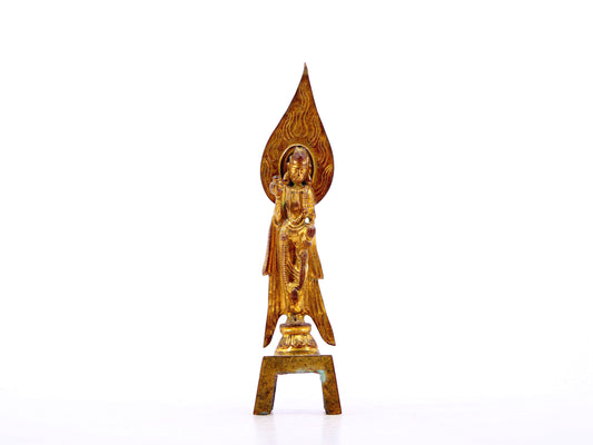 A serene gilt bronze statue of Bodhisattva