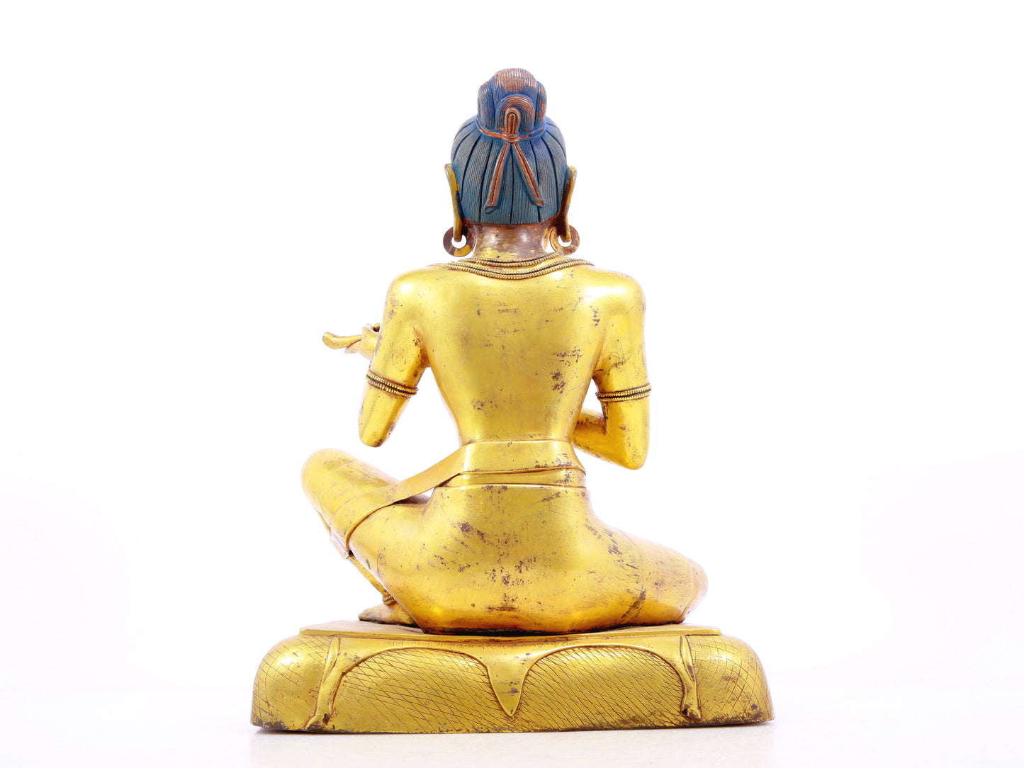 A solemn gilt bronze figure inlaid with turquoise