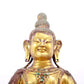 A solemn gilt bronze statue of Bodhisattva inlaid with precious stones