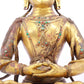 A solemn gilt bronze statue of Bodhisattva inlaid with precious stones