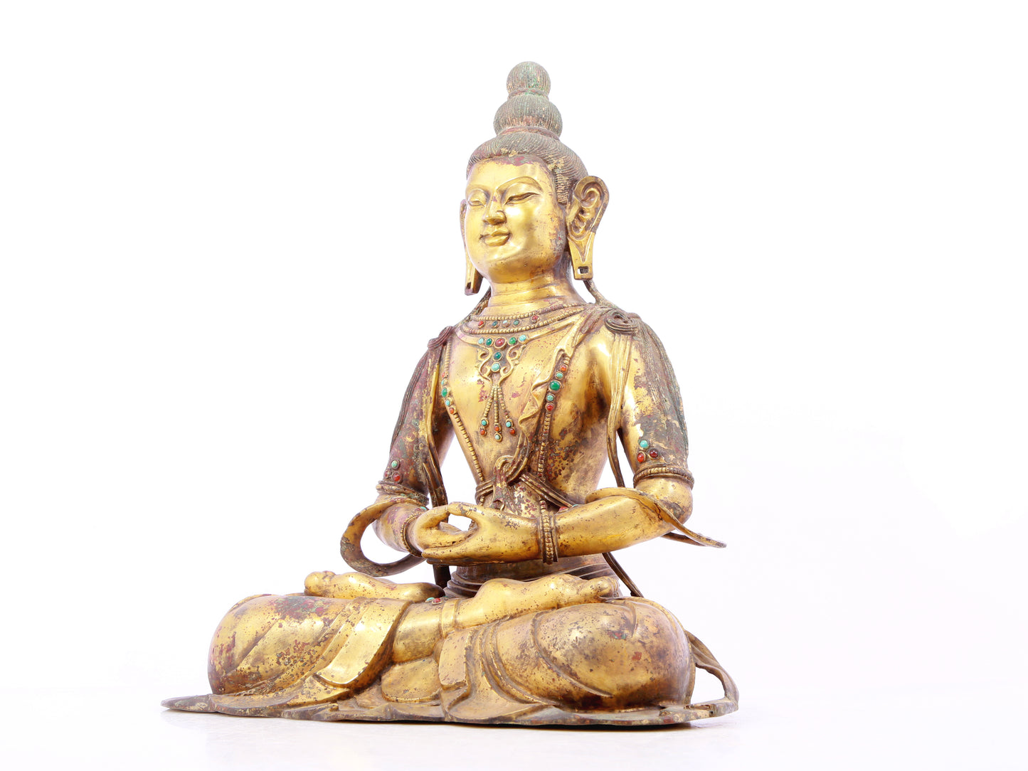 A solemn gilt bronze statue of Bodhisattva inlaid with precious stones