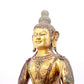 A solemn gilt bronze statue of Bodhisattva inlaid with precious stones