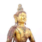 A solemn gilt bronze statue of Bodhisattva inlaid with precious stones