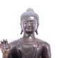 A solemn alloy bronze statue of Gautama Buddha