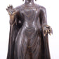 A solemn alloy bronze statue of Gautama Buddha