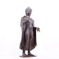 A solemn alloy bronze statue of Gautama Buddha