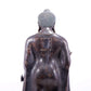 A solemn alloy bronze statue of Gautama Buddha