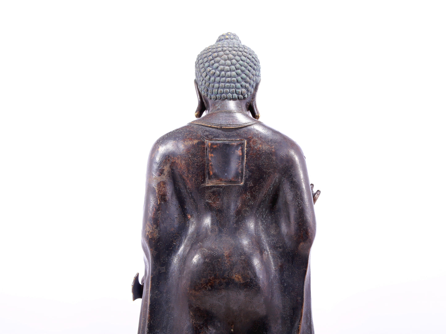 A solemn alloy bronze statue of Gautama Buddha