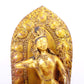 A solemn gilt bronze statue of Tara