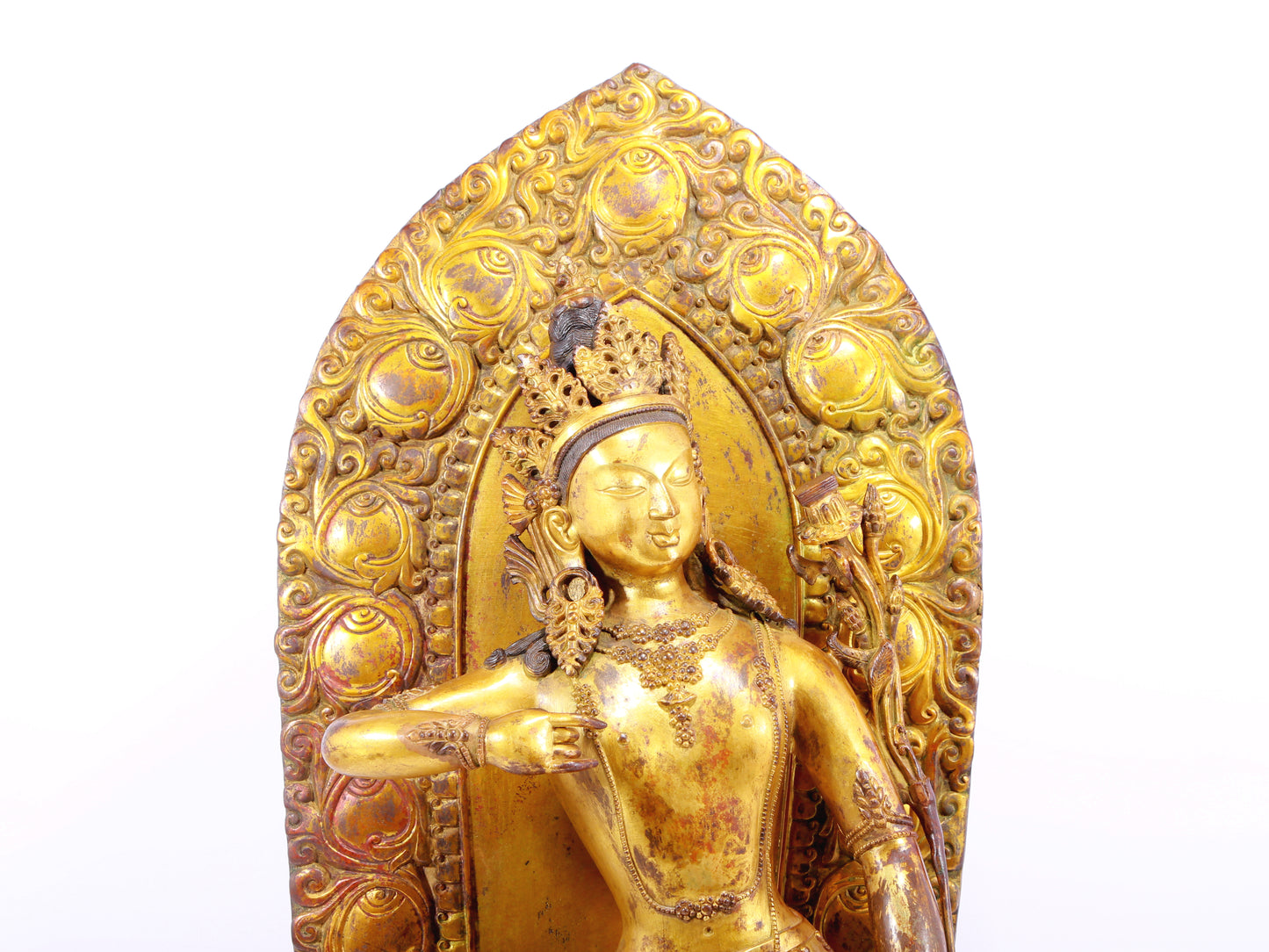 A solemn gilt bronze statue of Tara