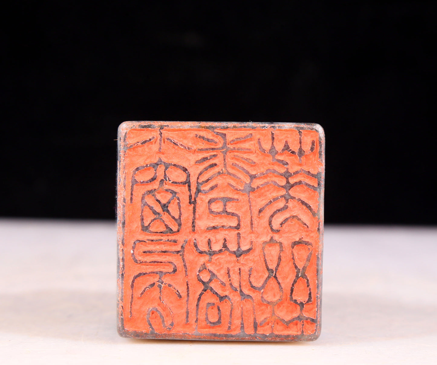 An exquisite black and white jade dragon seal