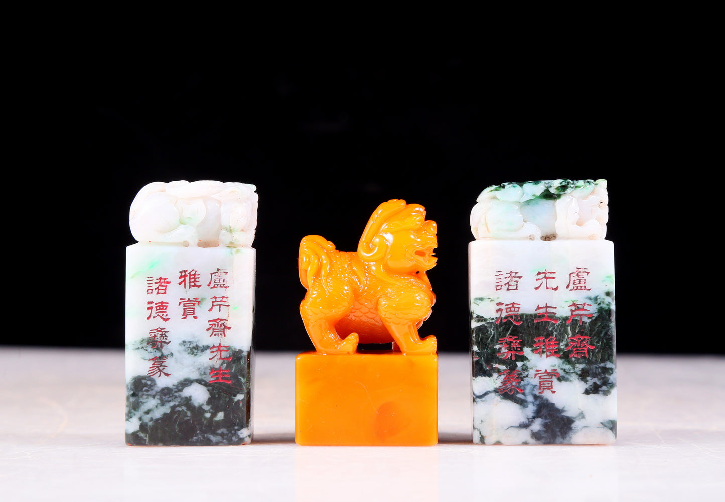 An exquisite Tianhuang stone auspicious animal seal and two jade auspicious animal seals