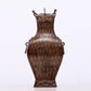 An exquisite bronze inlaid gold and silver animal ear bottle with lid