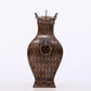 An exquisite bronze inlaid gold and silver animal ear bottle with lid