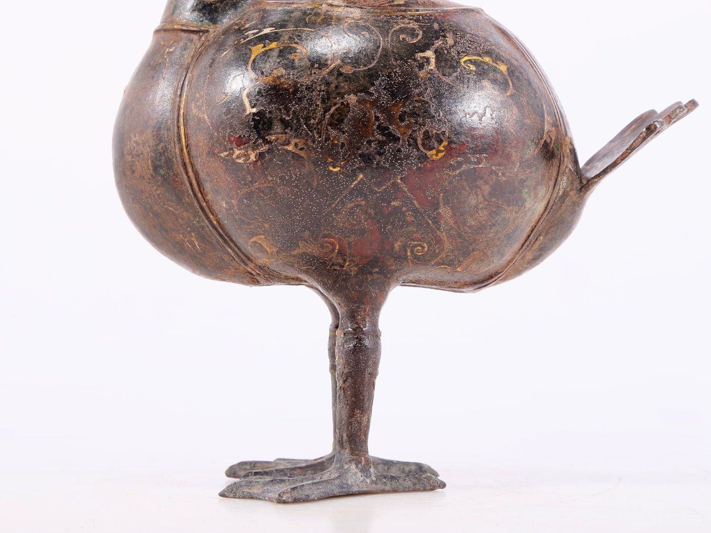 An exquisite bronze inlaid gold and silver duck-shaped ewer