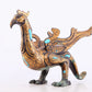 An exquisite bronze inlaid gold and turquoise phoenix ornament